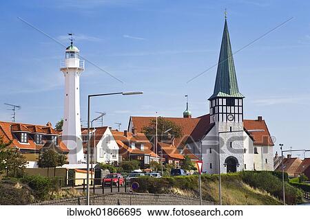 Stock Photography - Timber-frame houses, lighthouse and church Skt. Nicolaj Kirke in Rønne, Bornholm, Denmark, Europe. Fotosearch
