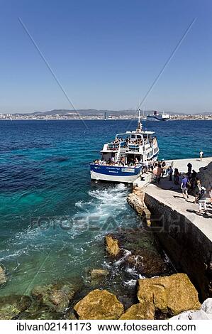 Tourists arriving by boat on the island Ile d'If, Frioul Archipelago, bay of Marseille, or Marseilles, France, Europe View Large Photo Image Stock Image - Tourists arriving by boat on the island Ile d'If, Frioul Archipelago, bay of Marseille, or Marseilles, France, Europe. Fotosearch