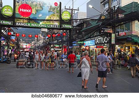 Stock Photo - Tourists between bars, shops and restaurants on Bangla Road, party district and red light district, Patong Beach, Phuket, Thailand, Asia. Fotosearch