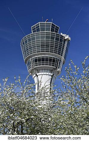 Stock Image - Tower with blossoming cherry trees, Munich Airport, Upper Bavaria, Bavaria, Germany, Europe. Fotosearch