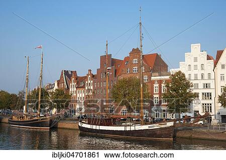 Traditional sailing boat on the Untertrave, Historic Houses, Lübeck, Schleswig-Holstein, Germany, Europe View Large Photo Image Stock Image - Traditional sailing boat on the Untertrave, Historic Houses, Lübeck, Schleswig-Holstein, Germany, Europe. Fotosearch