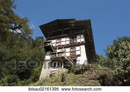 Traditional tall house on a slope, Cheri Goemba Monastery, Chagri Dorjeden Monastery, near Thimphu, Kingdom of Bhutan, South Asia, Asia View Large Photo Image Stock Photography - Traditional tall house on a slope, Cheri Goemba Monastery, Chagri Dorjeden Monastery, near Thimphu, Kingdom of Bhutan, South Asia, Asia. Fotosearch