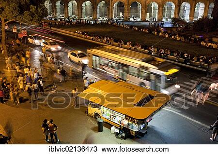 Traffic in front of the Colosseum at night, Rome, Italy, Europe View Large Photo Image Stock Image - Traffic in front of the Colosseum at night, Rome, Italy, Europe. Fotosearch