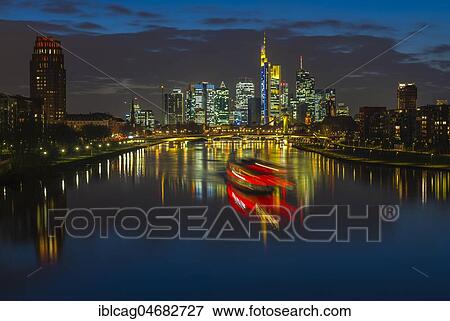 Trail of light from boat in front of skyline, blue hour, Osthafen, Frankfurt am Main, Hesse, Germany, Europe View Large Photo Image Stock Photo - Trail of light from boat in front of skyline, blue hour, Osthafen, Frankfurt am Main, Hesse, Germany, Europe. Fotosearch