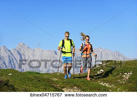 Trail running, hikers on the Eggenalm, behind Wilder Kaiser mountain range, Reit im Winkl, Upper Bavaria, Bavaria, Germany, Europe View Large Photo Image Stock Photo - Trail running, hikers on the Eggenalm, behind Wilder Kaiser mountain range, Reit im Winkl, Upper Bavaria, Bavaria, Germany, Europe. Fotosearch