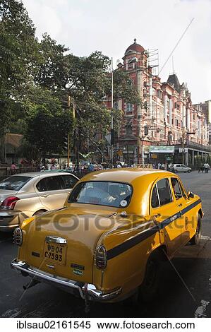 Transportation, yellow Ambassador taxi, old British colonial architecture, Chowringhee, Calcutta, Kolkata, West Bengal, India, South Asia, Asia View Large Photo Image Stock Photography - Transportation, yellow Ambassador taxi, old British colonial architecture, Chowringhee, Calcutta, Kolkata, West Bengal, India, South Asia, Asia. Fotosearch