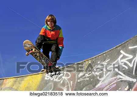 Stock Photo - Twelve-year-old skater in a skateboard track, skate bowl, Brussels, Belgium, Europe, PublicGround, Europe. Fotosearch