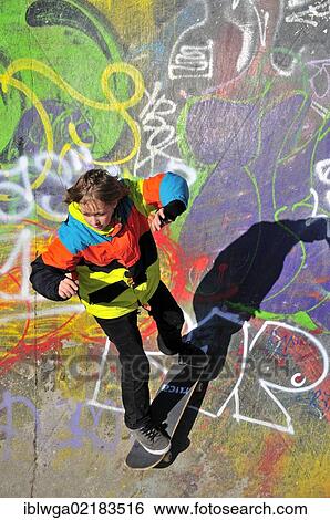 Twelve-year-old skater in a skateboard track, skate bowl, Brussels, Belgium, Europe, PublicGround, Europe View Large Photo Image Stock Photograph - Twelve-year-old skater in a skateboard track, skate bowl, Brussels, Belgium, Europe, PublicGround, Europe. Fotosearch