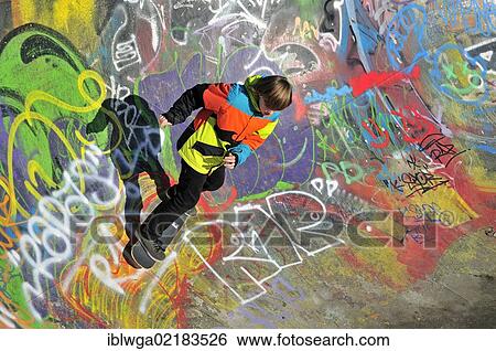 Stock Photograph - Twelve-year-old skater in a skateboard track, skate bowl, Brussels, Belgium, Europe, PublicGround, Europe. Fotosearch