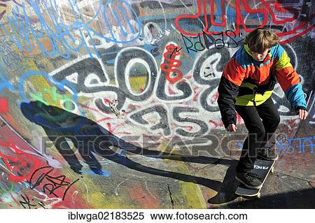 Twelve-year-old skater in a skateboard track, skate bowl, Brussels, Belgium, Europe, PublicGround, Europe View Large Photo Image Stock Photography - Twelve-year-old skater in a skateboard track, skate bowl, Brussels, Belgium, Europe, PublicGround, Europe. Fotosearch
