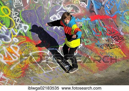 Twelve-year-old skater in a skateboard track, skate bowl, Brussels, Belgium, Europe, PublicGround, Europe View Large Photo Image Stock Photography - Twelve-year-old skater in a skateboard track, skate bowl, Brussels, Belgium, Europe, PublicGround, Europe. Fotosearch