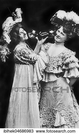 Two women drinking wine, 1910s, Germany, Europe View Large Photo Image Stock Image - Two women drinking wine, 1910s, Germany, Europe. Fotosearch