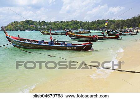 Typical colorful longtail boats, Rawai Beach, Phuket, Thailand, Asia View Large Photo Image Stock Photo - Typical colorful longtail boats, Rawai Beach, Phuket, Thailand, Asia. Fotosearch