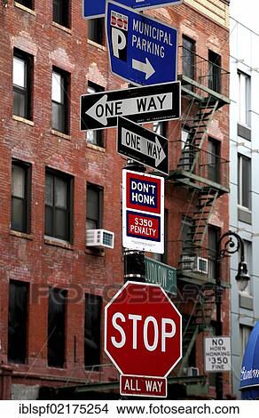 Various traffic signs, "one way" one-way street signs, stop sign, in front of brick building, New York, USA, North America View Large Photo Image Picture - Various traffic signs, "one way" one-way street signs, stop sign, in front of brick building, New York, USA, North America. Fotosearch