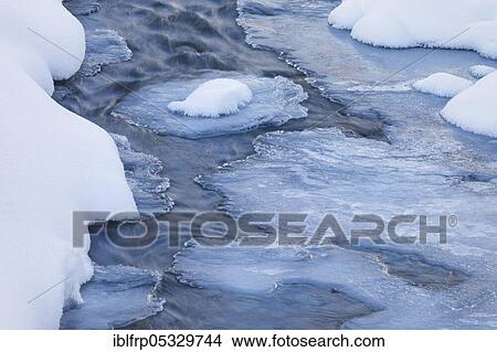 Picture - Vereister Bach, Inn tributary, Graubuenden, Switzerland, Europe. Fotosearch