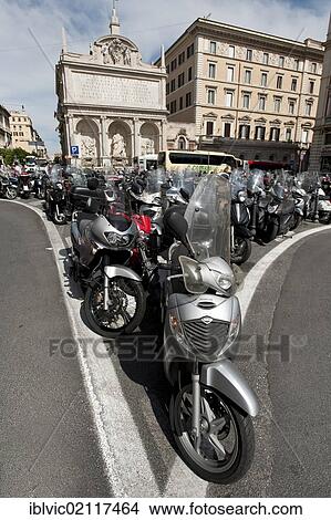 Vespa parking area on the Piazza San Bernardo, Rome, Italy, Europe View Large Photo Image Picture - Vespa parking area on the Piazza San Bernardo, Rome, Italy, Europe. Fotosearch