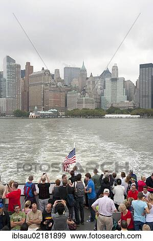 View from a boat with many people over the Hudson River towards the skyline and skyscrapers, Financial District, Lower Manhattan, New York City, USA, North America View Large Photo Image Stock Photo - View from a boat with many people over the Hudson River towards the skyline and skyscrapers, Financial District, Lower Manhattan, New York City, USA, North America. Fotosearch