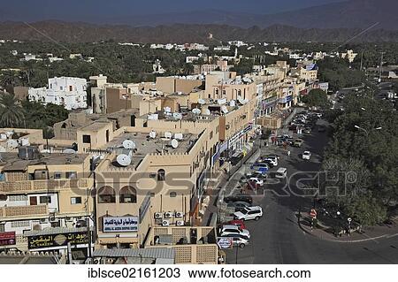 View from the fort over the town and the palm gardens of Nizwa, Oman, Arabian Peninsula, Middle East, Asia View Large Photo Image Stock Image - View from the fort over the town and the palm gardens of Nizwa, Oman, Arabian Peninsula, Middle East, Asia. Fotosearch