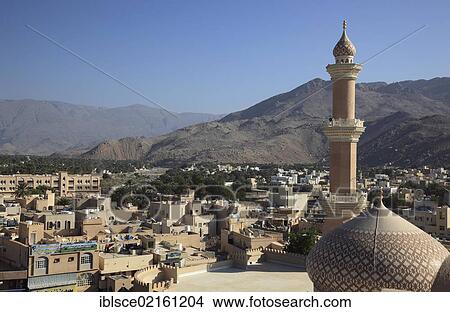 Picture - View from the fort over the town, the mosque and the palm gardens of Nizwa, Oman, Arabian Peninsula, Middle East, Asia. Fotosearch