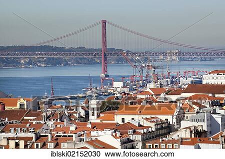 View from the Miradouro da Sao Jorge lookout on the former Moorish castle Castelo de Sao Jorge towards the historic town centre of Lisbon and the Rio Tejo River with the Ponte do 25 de Abril bridge, Lisbon, Portugal, Europe View Large Photo Image Stock Image - View from the Miradouro da Sao Jorge lookout on the former Moorish castle Castelo de Sao Jorge towards the historic town centre of Lisbon and the Rio Tejo River with the Ponte do 25 de Abril bridge, Lisbon, Portugal, Europe. Fotosearch