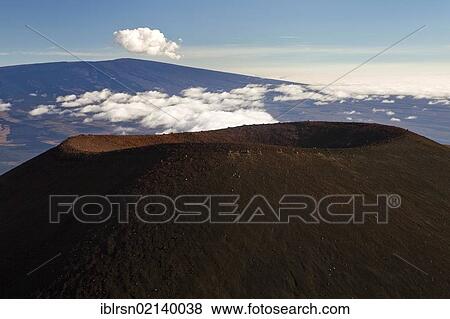 Stock Photo - View from the summit of the Mauna Kea Volcano, 4205m, over a nearby crater towards Mauna Loa on the horizon, Mauna Kea, Hawai'i, USA, North America. Fotosearch