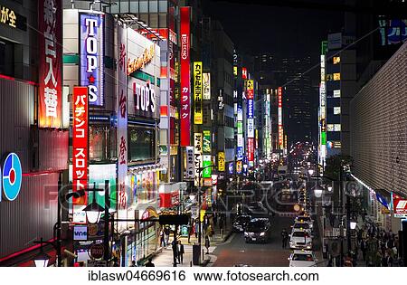 Stock Photograph - View into a street with illuminated advertising, shops, restaurants and bars, night view, Shimbashi, Tokyo, Japan, Asia. Fotosearch