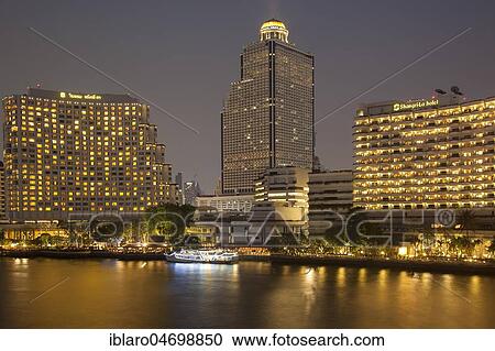 View of Shangri-La Hotel and Lebua State Tower, Chao Praya River, evening shot, Bangkok, Thailand, Asia View Large Photo Image Stock Image - View of Shangri-La Hotel and Lebua State Tower, Chao Praya River, evening shot, Bangkok, Thailand, Asia. Fotosearch