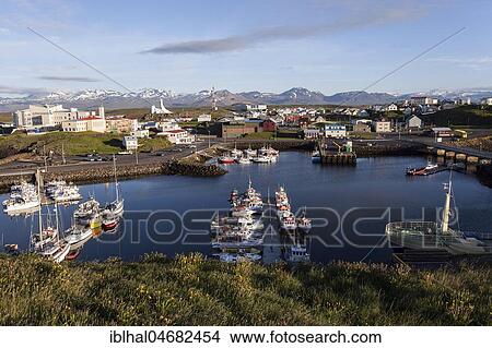View of the harbour with Stykkisholmur, snow-covered mountains in the back, Stykkisholmur, Snæfellsnes Peninsula, Iceland, Europe View Large Photo Image Picture - View of the harbour with Stykkisholmur, snow-covered mountains in the back, Stykkisholmur, Snæfellsnes Peninsula, Iceland, Europe. Fotosearch