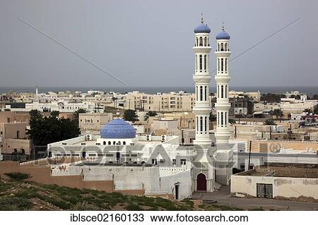 Stock Image - View over the mosque and the town of Sur, Oman, Arabian Peninsula, Middle East, Asia. Fotosearch