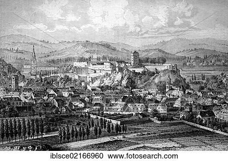 Stock Image - View over the pilgrimage town of Lourdes, France, historical wood engraving, 1886, Europe. Fotosearch