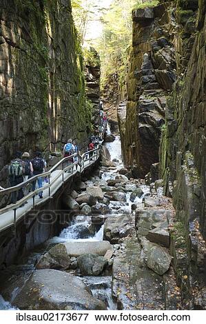 Walkway through The Flume Gorge, a narrow gorge between rocks, Franconia Notch State Park, White Mountains National Forest, New Hampshire, New England, USA, North America View Large Photo Image Stock Photo - Walkway through The Flume Gorge, a narrow gorge between rocks, Franconia Notch State Park, White Mountains National Forest, New Hampshire, New England, USA, North America. Fotosearch