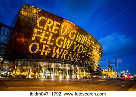 Welsh Millenium Center, architect Percy Thomas, event center, Blue Hour, Cardiff, South Glamorgan, Wales, United Kingdom, Europe View Large Photo Image Stock Image - Welsh Millenium Center, architect Percy Thomas, event center, Blue Hour, Cardiff, South Glamorgan, Wales, United Kingdom, Europe. Fotosearch