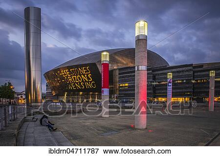 Welsh Millenium Centre, Architect Percy Thomas, Event Centre, Dusk, Cardiff, South Glamorgan, Wales, United Kingdom, Europe View Large Photo Image Stock Photo - Welsh Millenium Centre, Architect Percy Thomas, Event Centre, Dusk, Cardiff, South Glamorgan, Wales, United Kingdom, Europe. Fotosearch