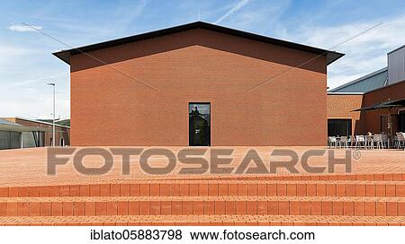 Stock Photo - Windowless red brick building in the shape of a warehouse, modern architecture, architect Herzog &amp; de Meuron, Schaudepot, Vitra Campus, Vitra Design Museum, Weil am Rhein, Baden-Württemberg, Germany, Europe. Fotosearch