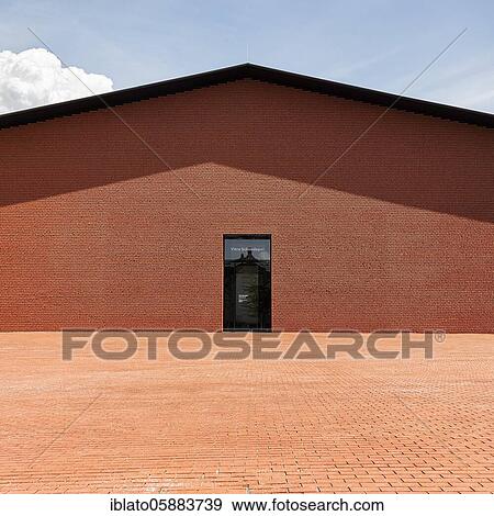Windowless red brick building with gable roof and glass door, modern architecture, architect Herzog & de Meuron, Schaudepot, Vitra Campus, Vitra Design Museum, Weil am Rhein, Baden-Württemberg, Germany, Europe View Large Photo Image Stock Photo - Windowless red brick building with gable roof and glass door, modern architecture, architect Herzog & de Meuron, Schaudepot, Vitra Campus, Vitra Design Museum, Weil am Rhein, Baden-Württemberg, Germany, Europe. Fotosearch