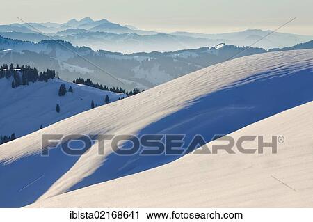Stock Image - Winter mood on the high alp with views to Mt Rigis and Eastern Switzerland, Appenzell, Swiss Alps, Switzerland, Europe, PublicGround, Europe. Fotosearch