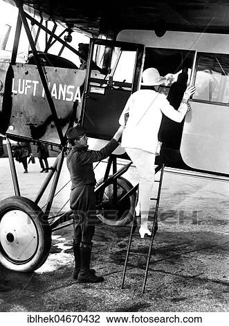 Woman boarding a Lufthansa passenger plane, 1930s, Berlin, Germany, Europe View Large Photo Image Stock Image - Woman boarding a Lufthansa passenger plane, 1930s, Berlin, Germany, Europe. Fotosearch