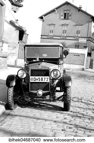 Stock Image - Woman driving a car, 1920s, Germany, Europe. Fotosearch