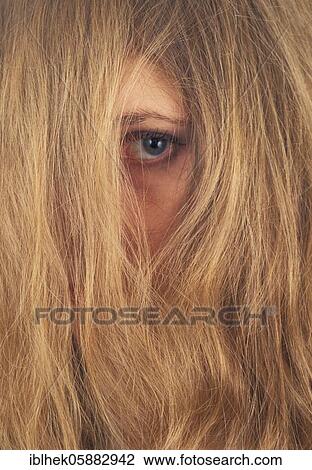 Stock Image - Woman, hair covers the face, Berlin, Germany, Europe. Fotosearch