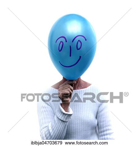 Woman with a blue balloon in front of her face, cut out View Large Photo Image Stock Photo - Woman with a blue balloon in front of her face, cut out. Fotosearch