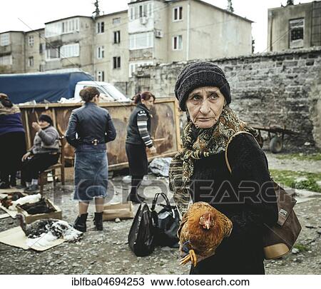 Woman with Chicken, Market Day, Gali, Mingrelia, Abkhazia, Georgia, Asia View Large Photo Image Stock Image - Woman with Chicken, Market Day, Gali, Mingrelia, Abkhazia, Georgia, Asia. Fotosearch