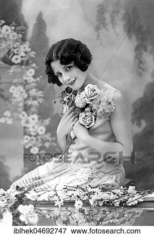 Woman with Flowers, 1920s, Germany, Europe View Large Photo Image Stock Photo - Woman with Flowers, 1920s, Germany, Europe. Fotosearch