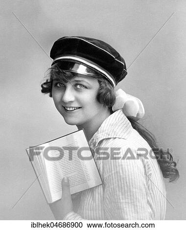 Woman with student hat reading a book, 1920s, Germany, Europe View Large Photo Image Stock Image - Woman with student hat reading a book, 1920s, Germany, Europe. Fotosearch
