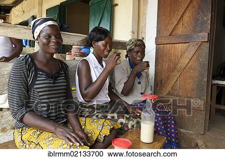 Women drinking palm wine, Bamenda, Cameroon, Africa View Large Photo Image Stock Image - Women drinking palm wine, Bamenda, Cameroon, Africa. Fotosearch