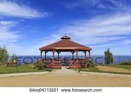 Stock Image - Wooden pavilion on the banks of Lac Saint-Jean, Desbiens, Québec Province, Canada, North America. Fotosearch