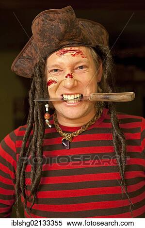 Stock Photography - Young man in a pirate costume. Fotosearch