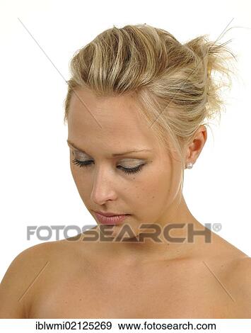 Stock Photo - Young woman, introverted, portrait. Fotosearch