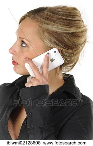 Young woman wearing a black shirt is making a phone call, smartphone, iPhone, white View Large Photo Image Stock Photo - Young woman wearing a black shirt is making a phone call, smartphone, iPhone, white. Fotosearch