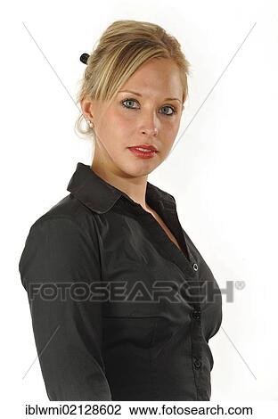 Stock Image - Young woman wearing a black shirt, portrait. Fotosearch