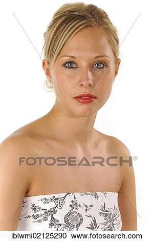 Young woman wearing a cocktail dress, portrait View Large Photo Image Stock Image - Young woman wearing a cocktail dress, portrait. Fotosearch
